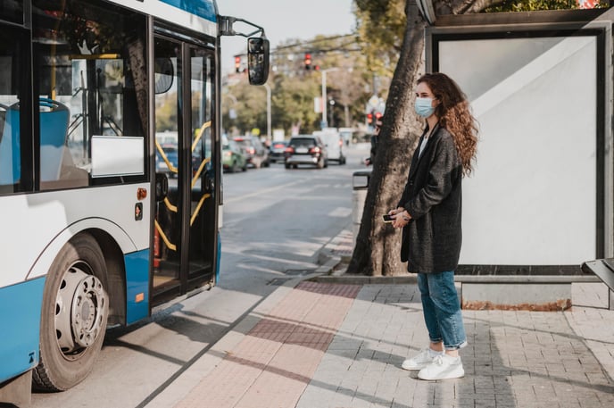 girl waiting for the bus