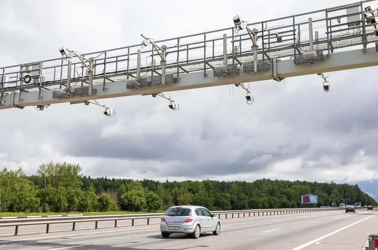 toll-point-road-against-cloudy-sky-with-car-road-jpg (1) (1)