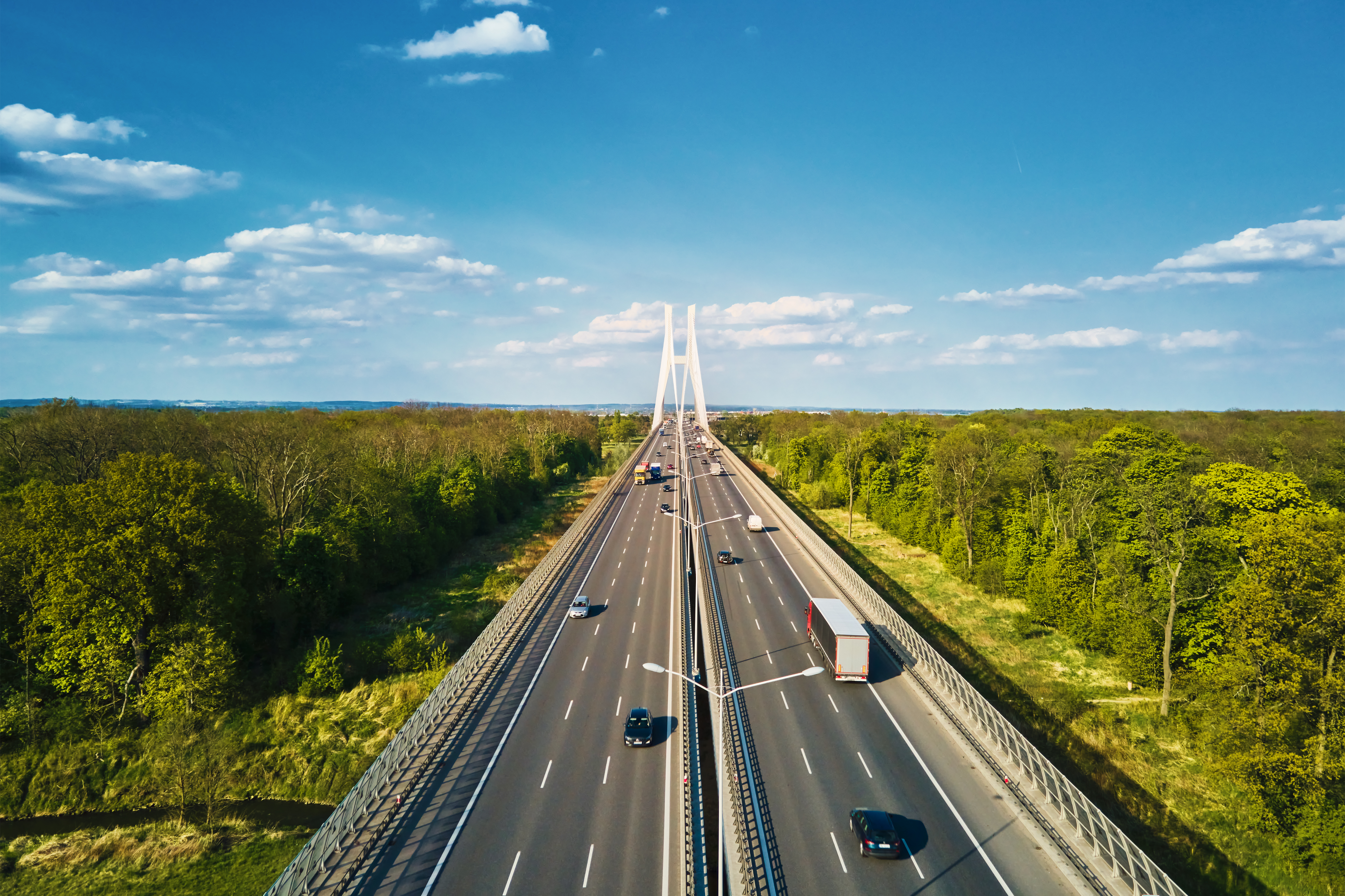 Large bridge over river with cars traffic